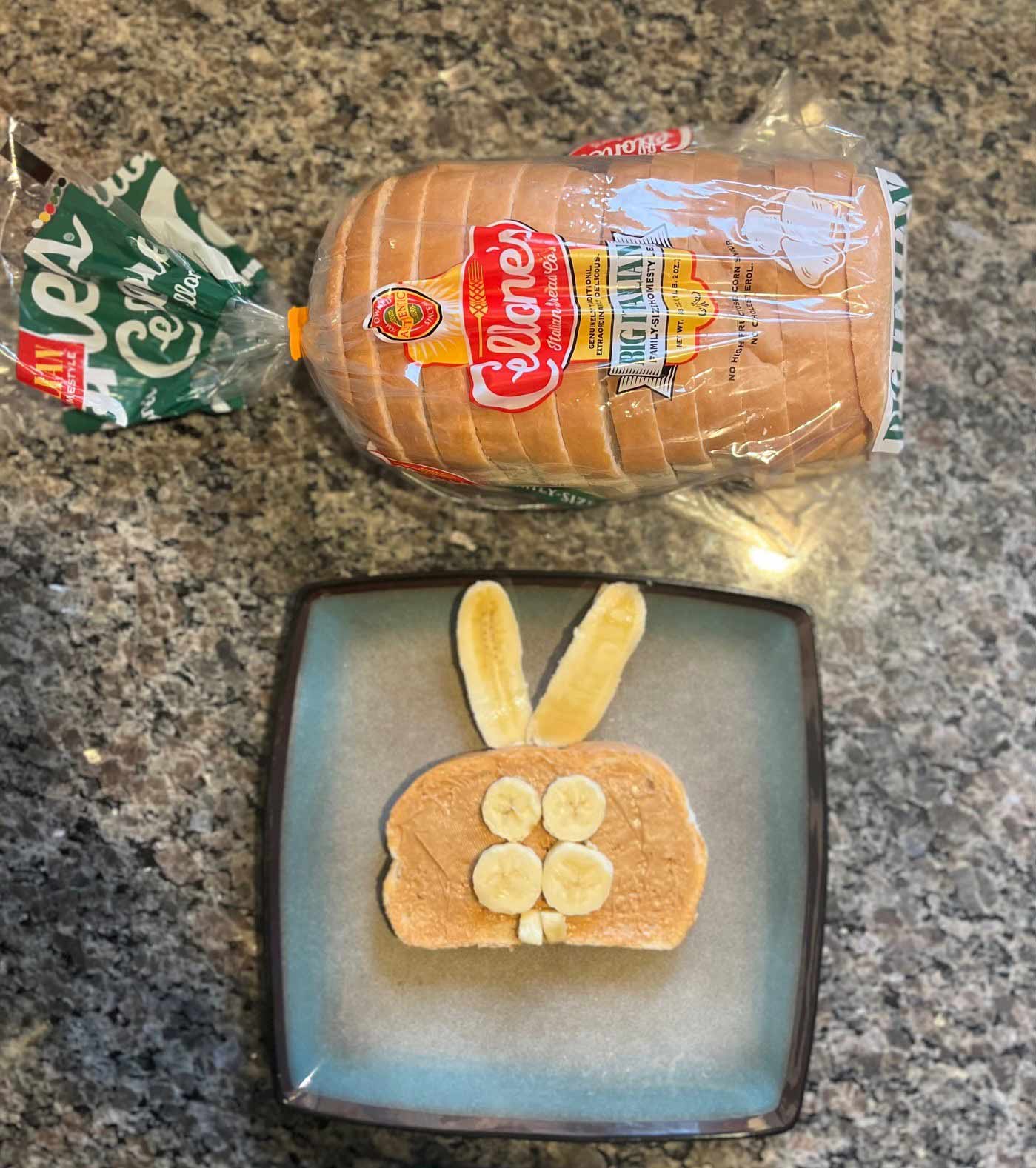 Bread with two banana wheels and bunny ears and bunny teeth